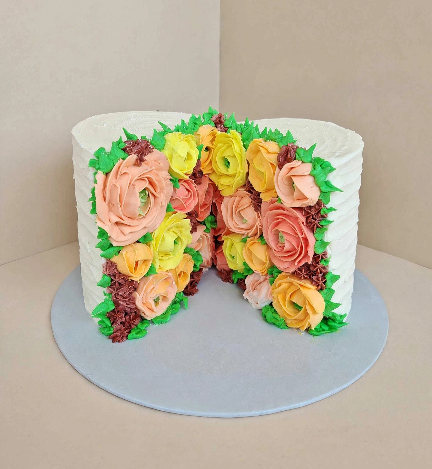 White fault-line cake filled with buttercream florals