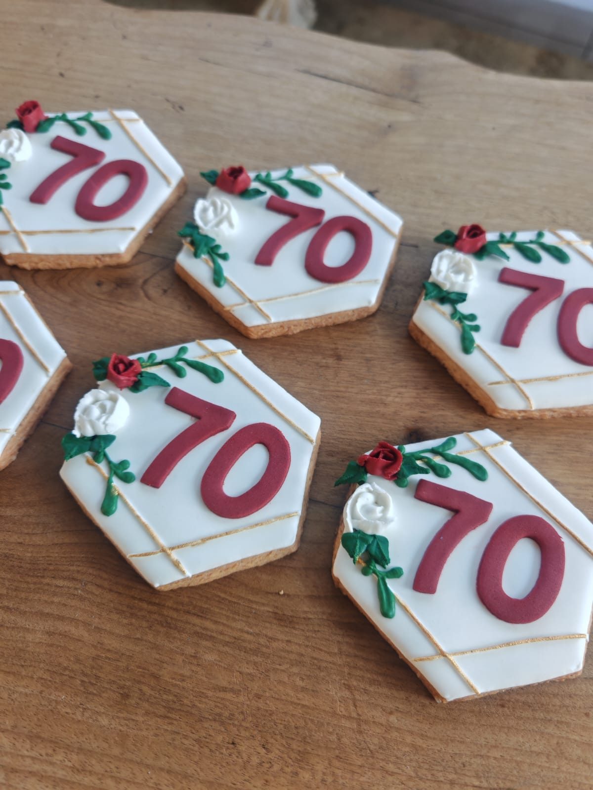 Iced cookies piped with the number seventy